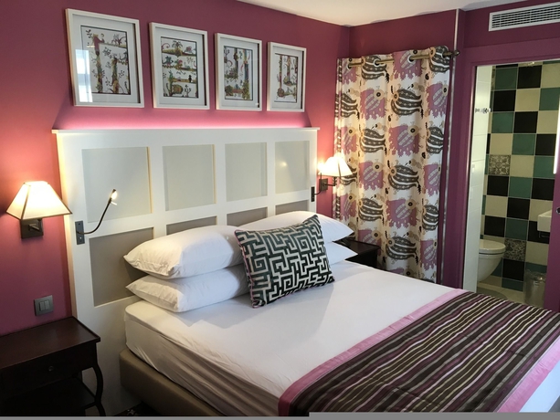 Imagen de la habitación del Hotel Les Tournelles. Foto 8