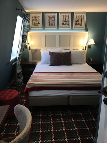 Imagen de la habitación del Hotel Les Tournelles. Foto 10