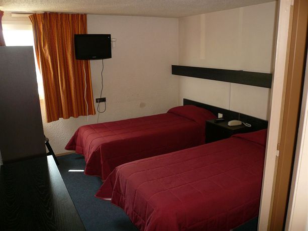 Imagen de la habitación del Hotel Les Tourrades. Foto 10