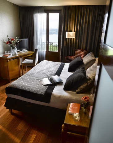 Imagen de la habitación del Hotel Les Tresoms Lake and Spa Resort. Foto 4