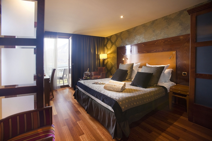 Imagen de la habitación del Hotel Les Tresoms Lake and Spa Resort. Foto 6