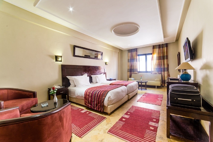 Imagen de la habitación del Hotel Les Trois Palmiers. Foto 5