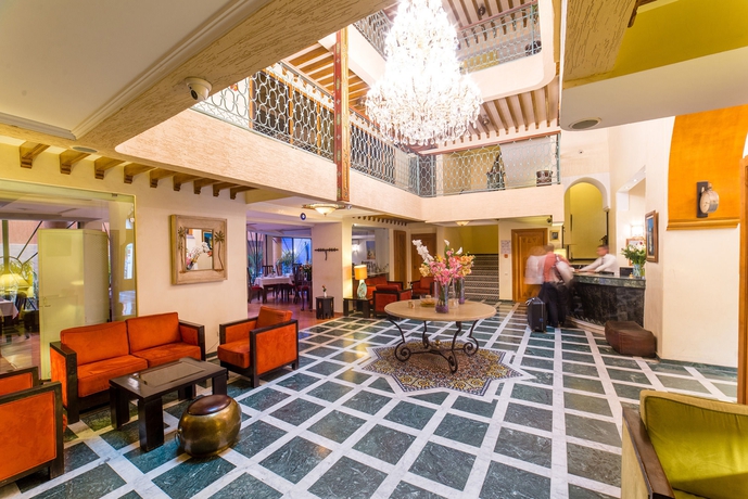 Imagen de los interiores del Hotel Les Trois Palmiers. Foto 14