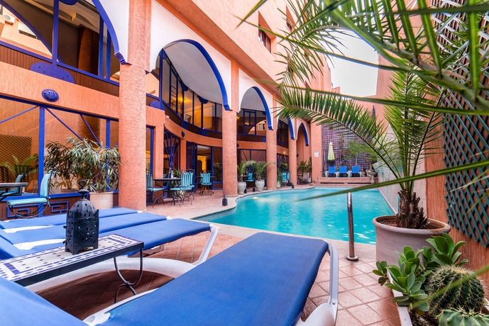 Imagen de la piscina del Hotel Les Trois Palmiers. Foto 15