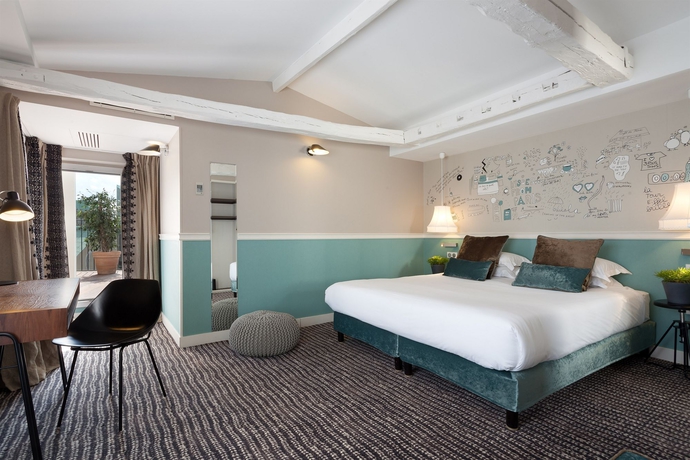 Imagen de la habitación del Hotel Les Trois Poussins. Foto 8