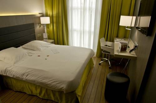 Imagen de la habitación del Hotel Les Tuileries. Foto 8