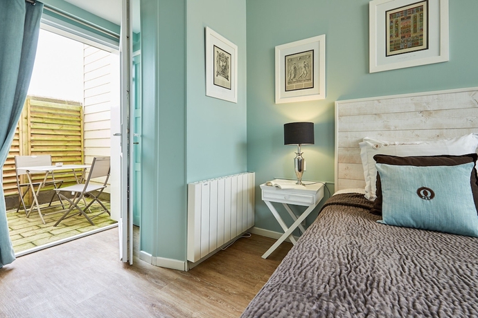 Imagen de la habitación del Hotel Les Villas D'arromanches. Foto 6