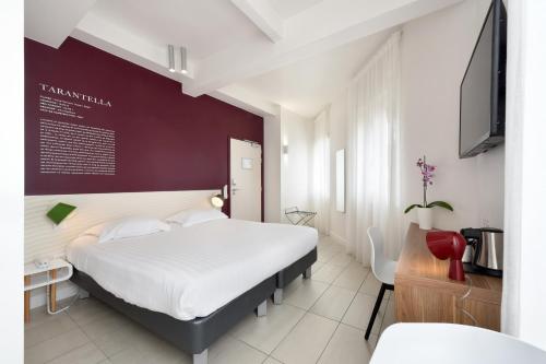 Imagen de la habitación del Hotel Les Voiles. Foto 11