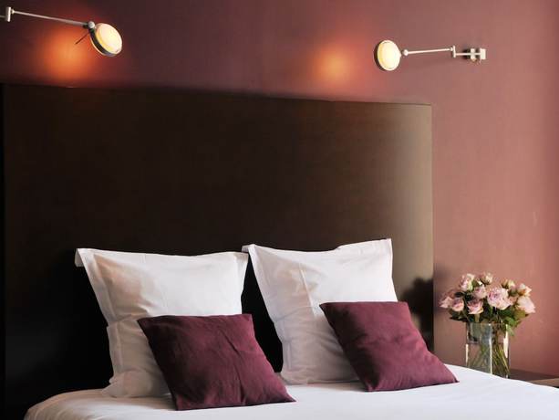 Imagen de la habitación del Hotel Les jardins du canal. Foto 10