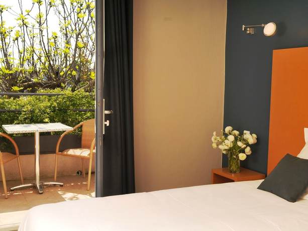 Imagen de la habitación del Hotel Les jardins du canal. Foto 12