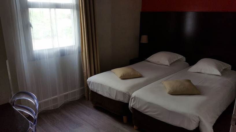 Imagen de la habitación del Hotel Les jardins du canal. Foto 13