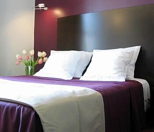 Imagen de la habitación del Hotel Les jardins du canal. Foto 15