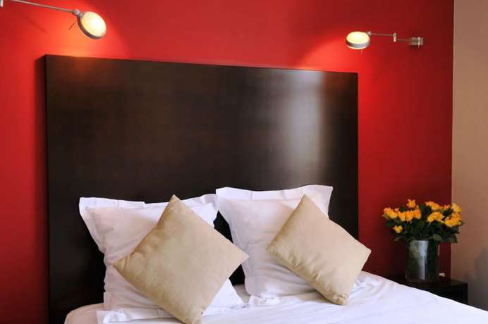 Imagen de la habitación del Hotel Les jardins du canal. Foto 16