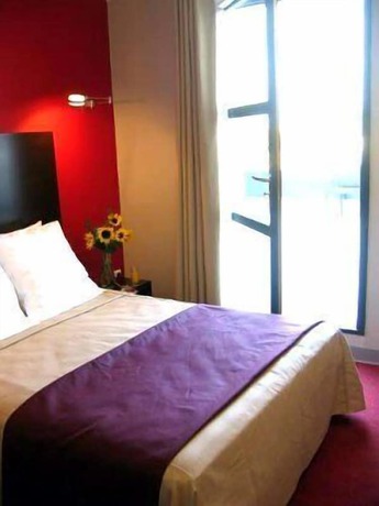 Imagen de la habitación del Hotel Les jardins du canal. Foto 19