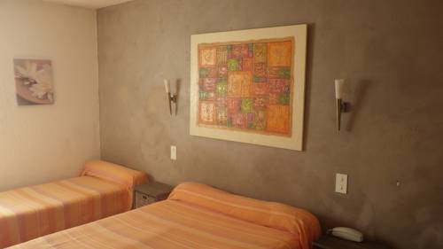 Imagen de la habitación del Hotel L'escapade, LE LAVANDOU. Foto 11