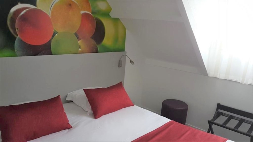 Imagen de la habitación del Hotel L'escargotière. Foto 7