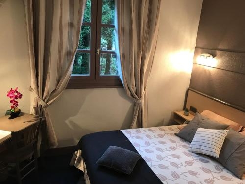 Imagen de la habitación del Hotel L'escoundillou. Foto 8