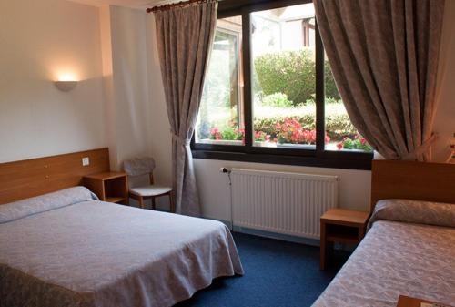 Imagen de la habitación del Hotel L'escoundillou. Foto 10