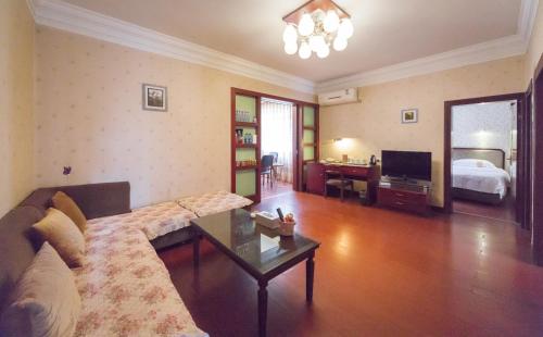 Imagen de la habitación del Hotel Leshan Jinye. Foto 5