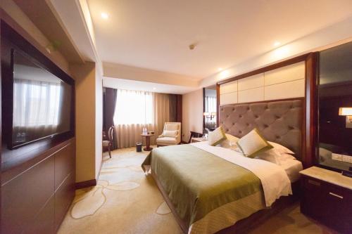 Imagen de la habitación del Hotel Leshan Jinye. Foto 6