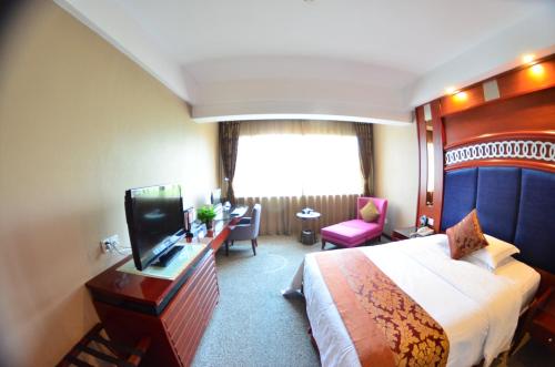 Imagen de la habitación del Hotel Leshan Jinye. Foto 8