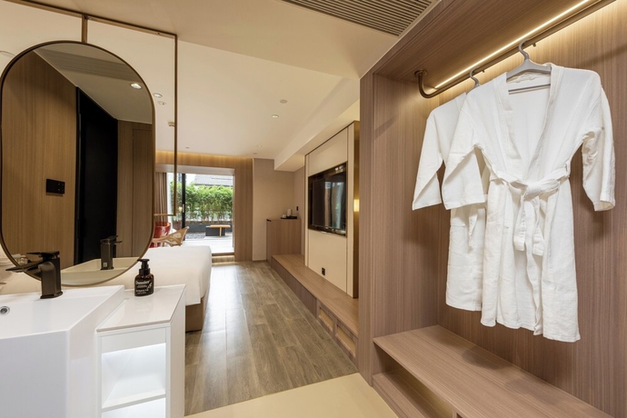 Imagen de la habitación del Hotel Leshan Manfu. Foto 11