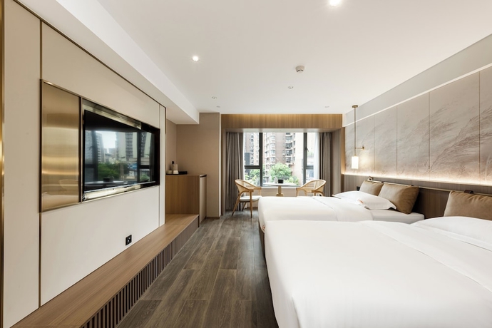 Imagen de la habitación del Hotel Leshan Manfu. Foto 13