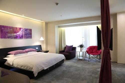 Imagen de la habitación del Hotel Leshan Wow. Foto 6