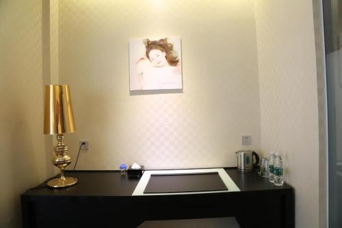 Imagen de la habitación del Hotel Leshan Wow. Foto 8