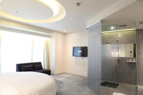 Imagen de la habitación del Hotel Leshan Wow. Foto 9