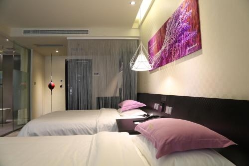 Imagen de la habitación del Hotel Leshan Wow. Foto 10