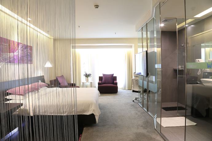 Imagen de la habitación del Hotel Leshan Wow. Foto 13