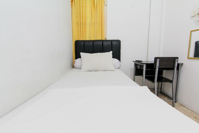 Imagen de la habitación del Hotel Lestari Guesthouse. Foto 9