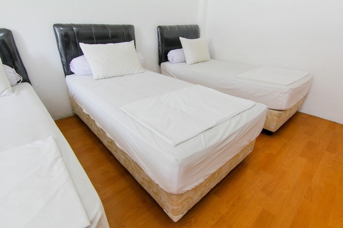 Imagen de la habitación del Hotel Lestari Guesthouse. Foto 12