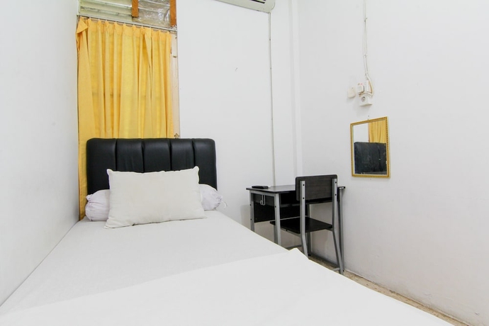 Imagen de la habitación del Hotel Lestari Guesthouse. Foto 13