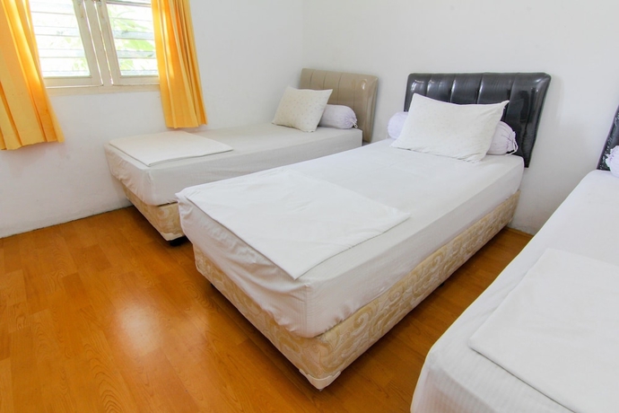 Imagen de la habitación del Hotel Lestari Guesthouse. Foto 14