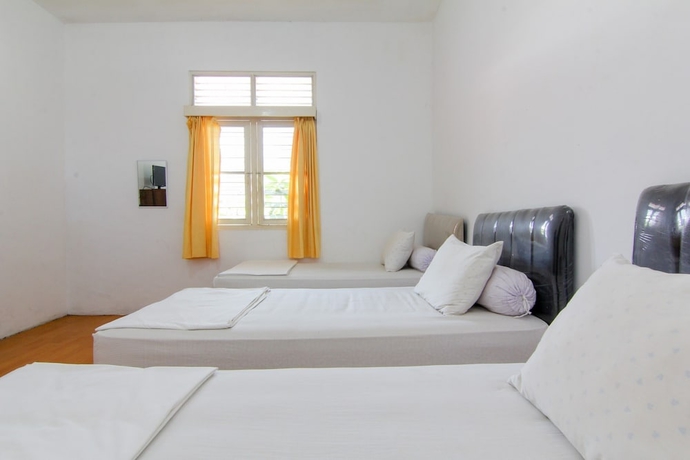 Imagen de la habitación del Hotel Lestari Guesthouse. Foto 15