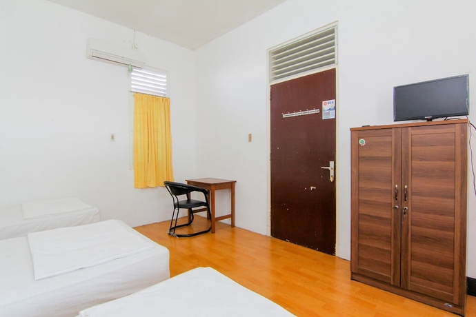 Imagen de la habitación del Hotel Lestari Guesthouse. Foto 16
