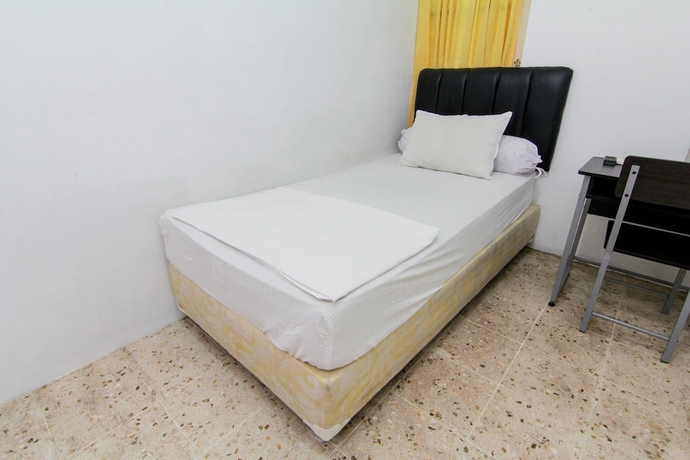 Imagen de la habitación del Hotel Lestari Guesthouse. Foto 17