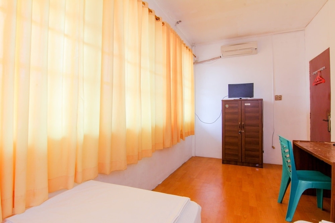 Imagen de la habitación del Hotel Lestari Guesthouse. Foto 18