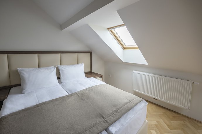 Imagen de la habitación del Hotel Letna Garden Suites. Foto 4