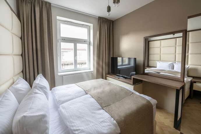 Imagen de la habitación del Hotel Letna Garden Suites. Foto 6