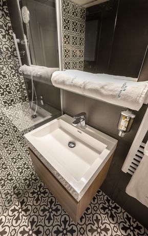 Imagen de la habitación del Hotel Letna Garden Suites. Foto 16