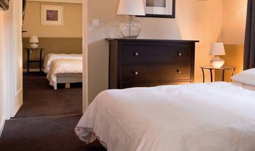 Imagen de la habitación del Hotel L'etoile D'or. Foto 2