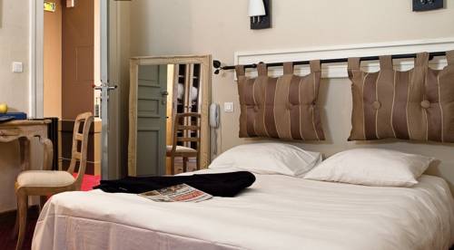 Imagen de la habitación del Hotel L'etoile D'or. Foto 3