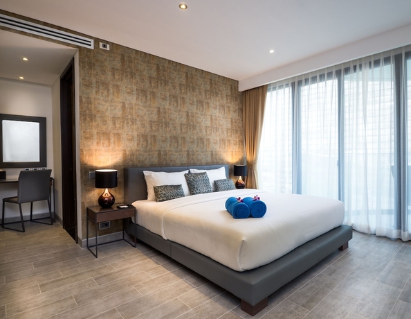 Imagen de la habitación del Hotel LetsPhuket Twin Sands Resort and Spa. Foto 9