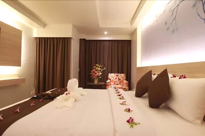 Imagen de la habitación del Hotel Levana Pattaya. Foto 7
