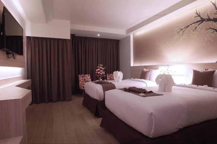 Imagen de la habitación del Hotel Levana Pattaya. Foto 17