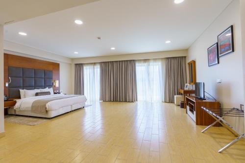 Imagen de la habitación del Hotel Levatio Suites Muscat, a member of Radisson Individuals. Foto 10