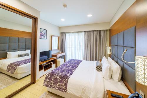 Imagen de la habitación del Hotel Levatio Suites Muscat, a member of Radisson Individuals. Foto 17